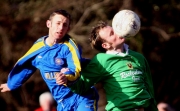 Close Control by Gavin O'Connor of Passage, under pressure from Ian Kenny. AOH Cup, Passage 1 Carrigtwohill 0, Rockenham, 25.02.06, Billy Lyons.